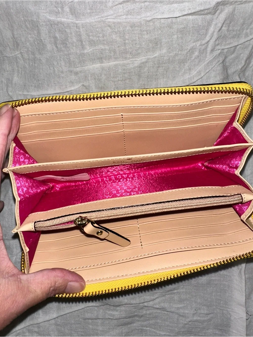 kate spade Yellow Zip-Around Leather Wallet with Logo Plaque